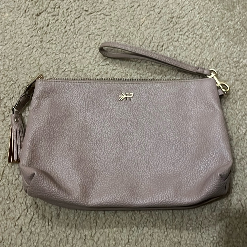 Woman’s diaper wristlet. Never used.